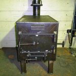 How to install a potbelly stove in a change house