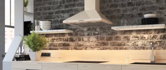 At what height above gas stoves are hoods hung?