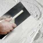 Plastering with tile adhesive: a waste of time or the right choice?